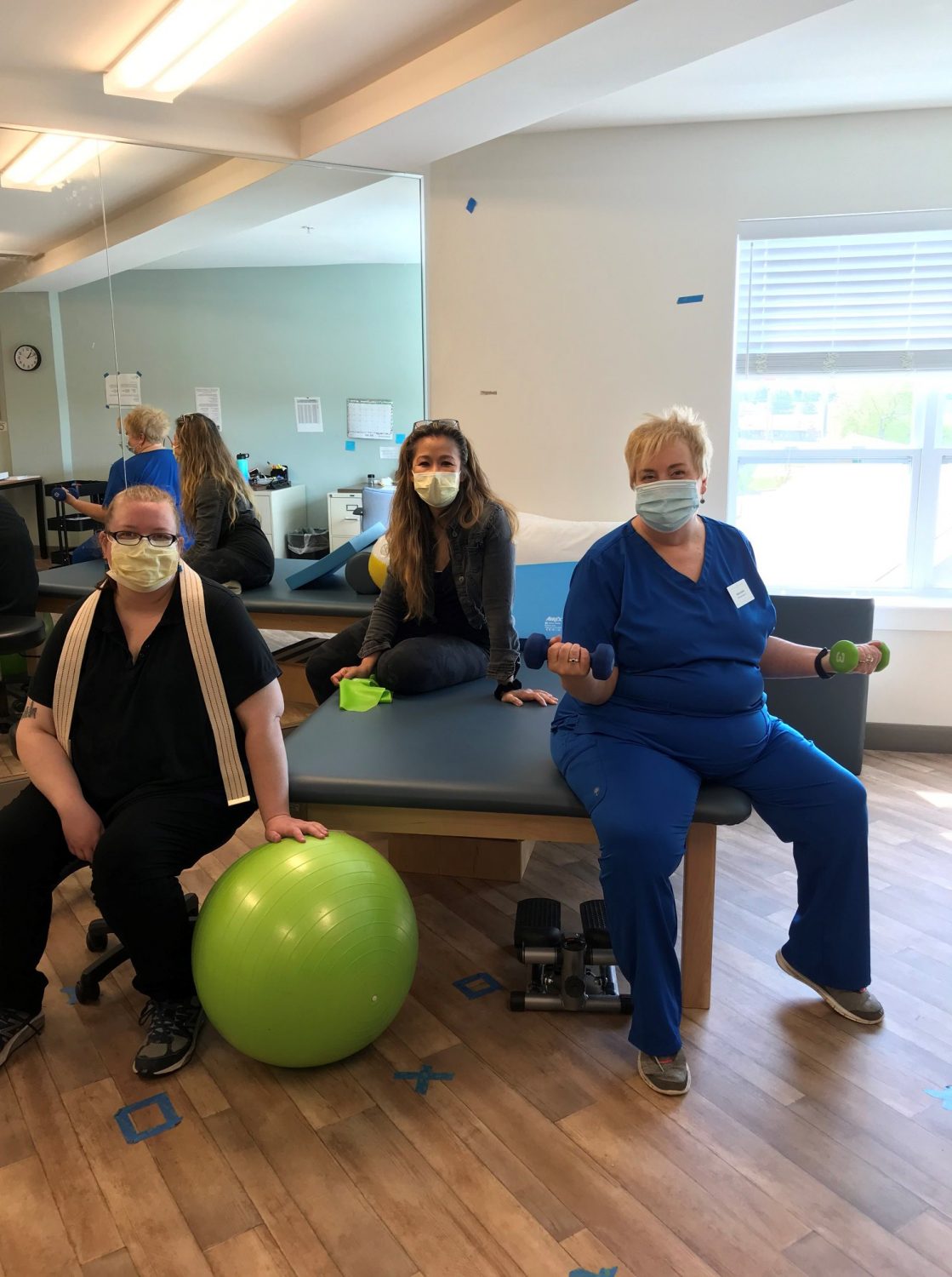 Residents and staff engaged in an exercise session