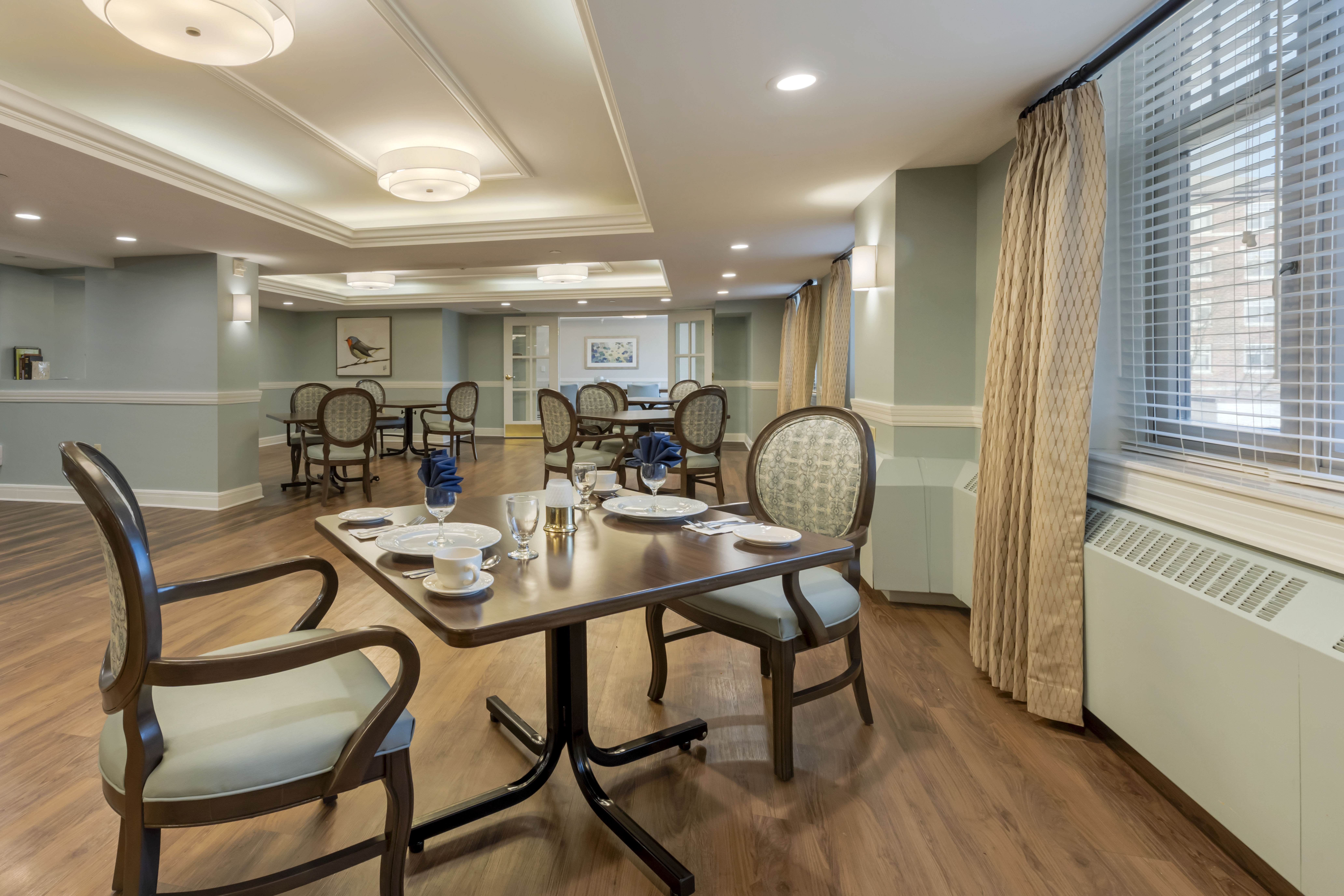Dining room with tables set for meals