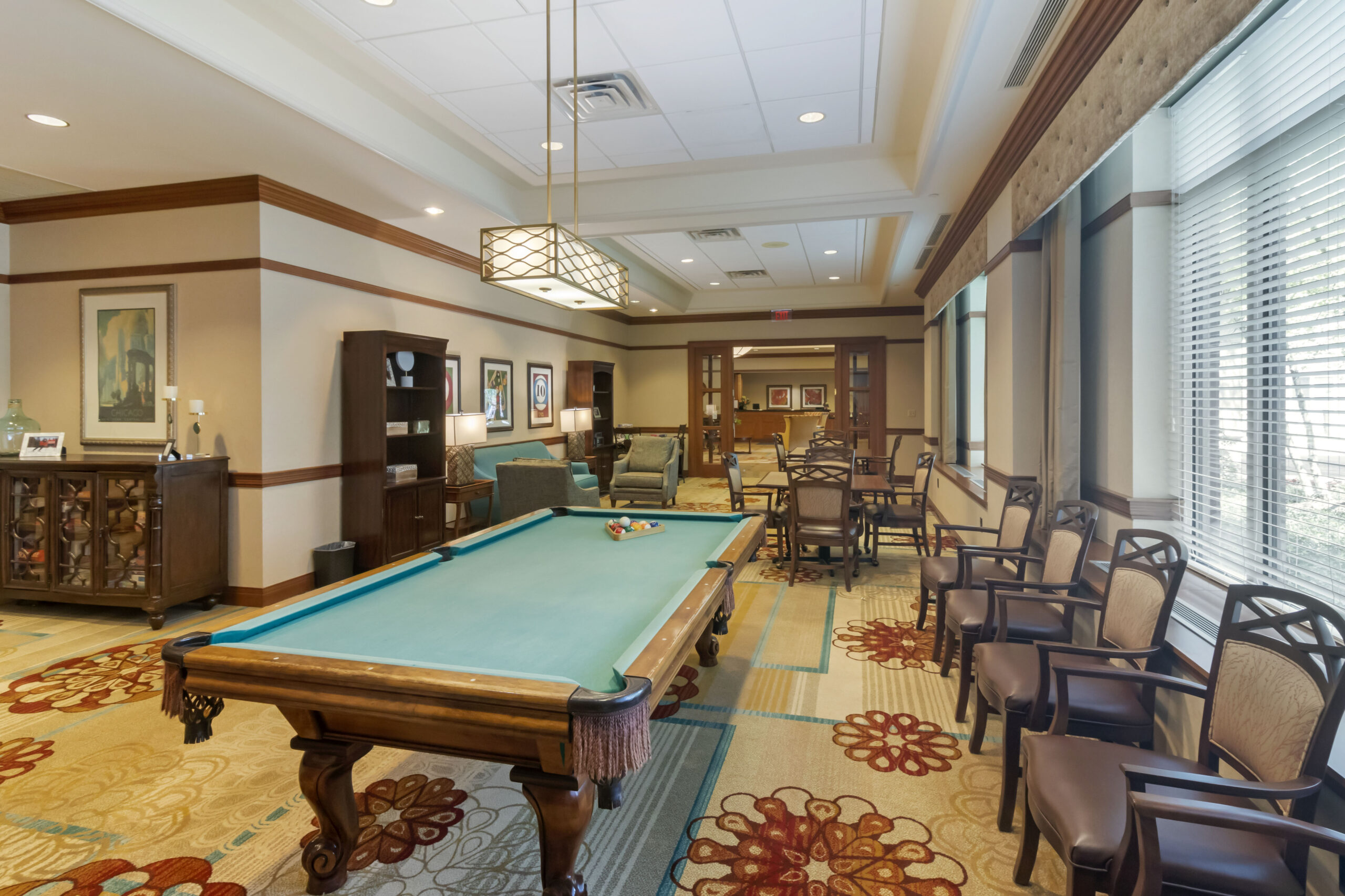 Common area with a pool table and seating