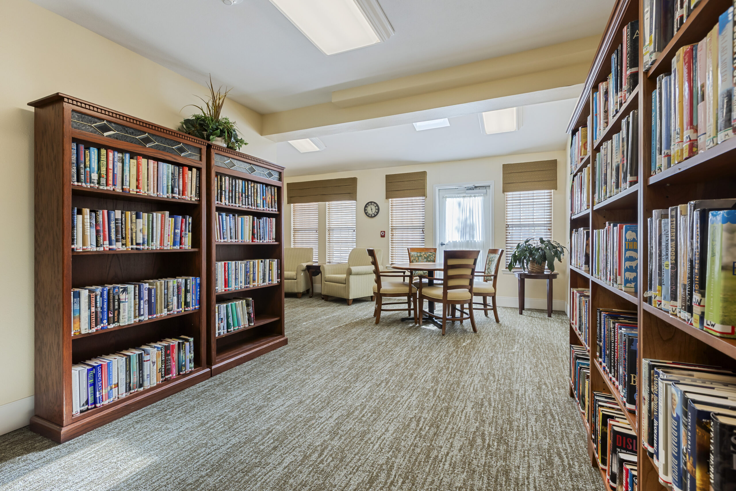 Interior view of a cozy reading area with bookshelves