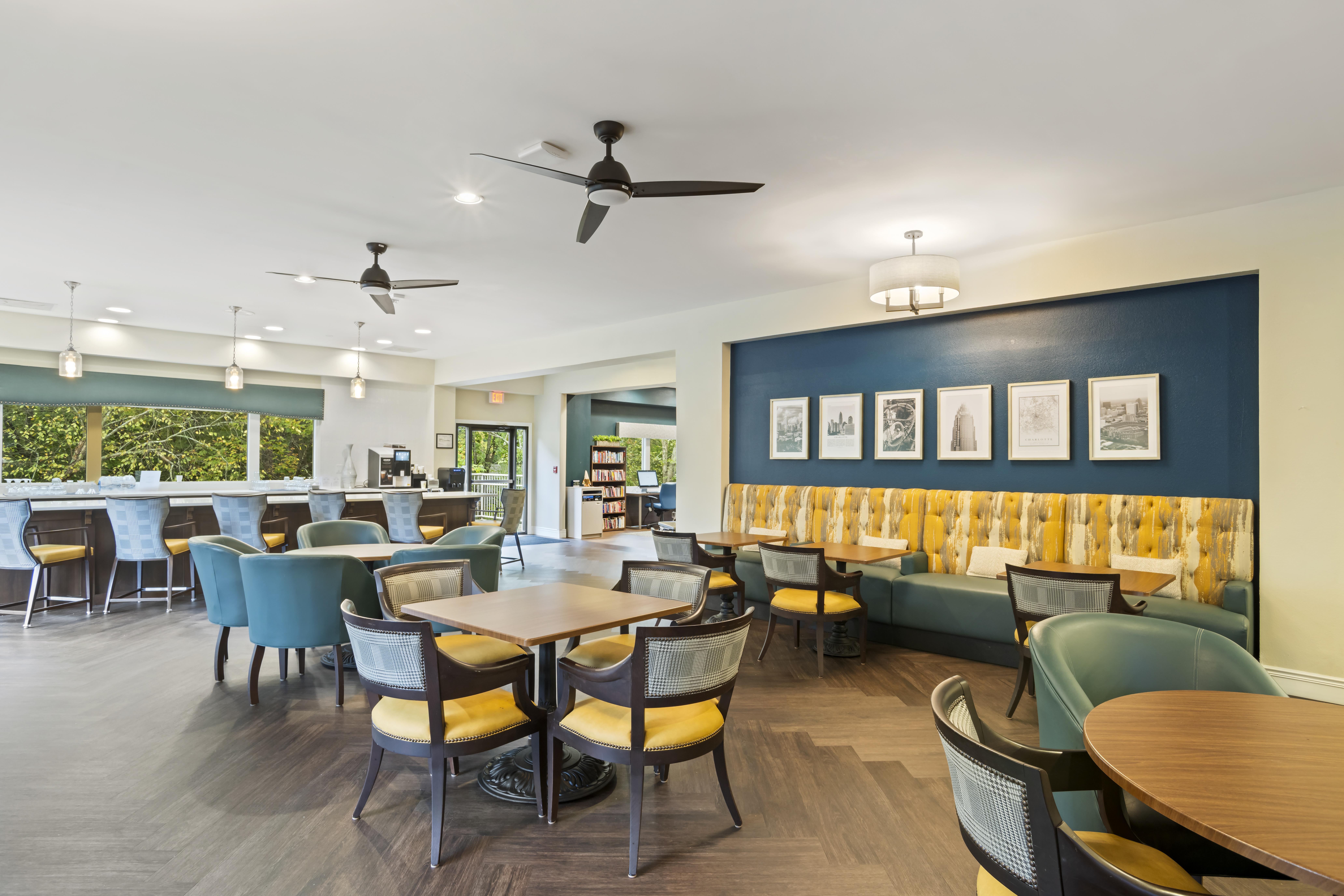 Common area with seating and bookshelves