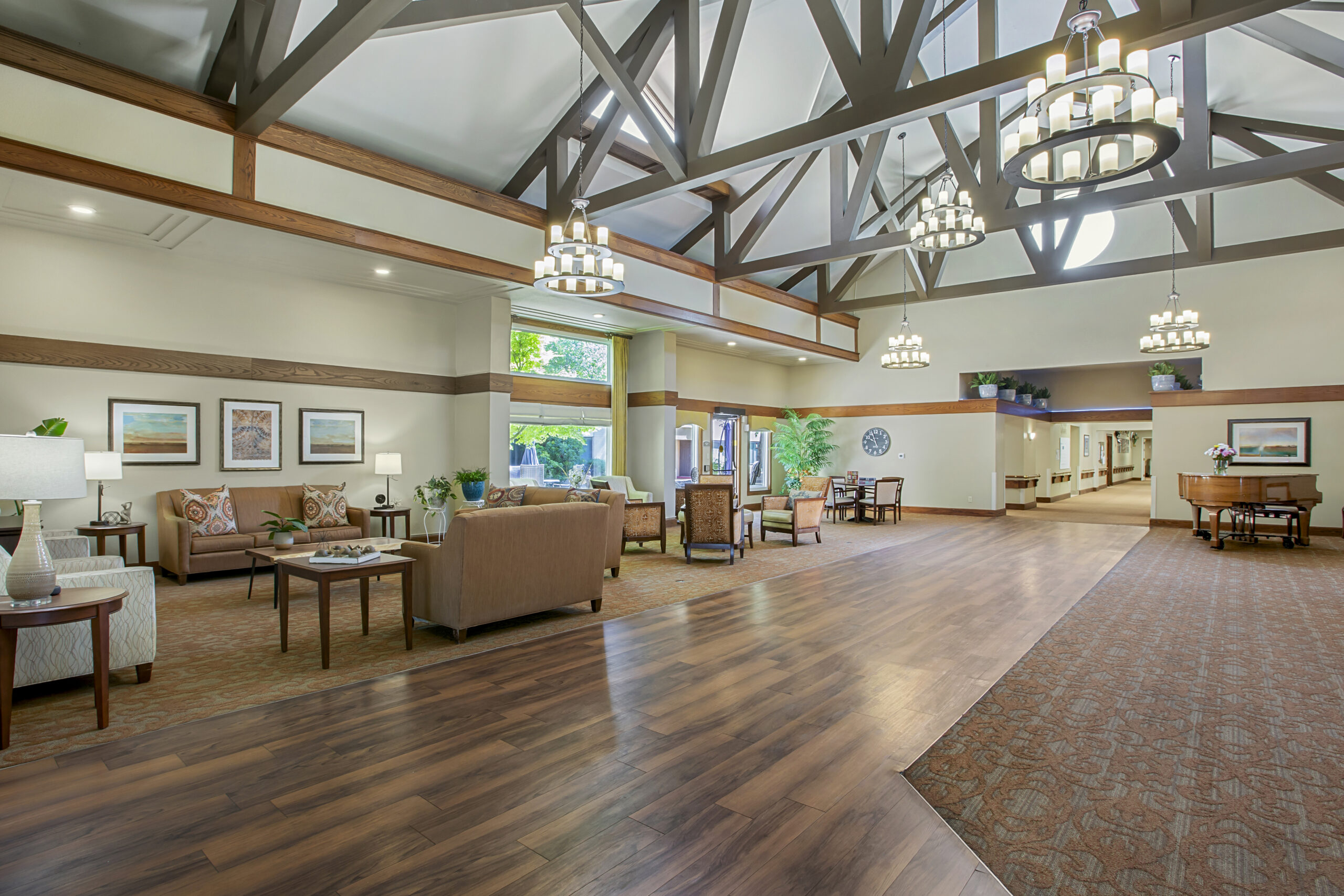 Bright common area with stylish furniture and decor