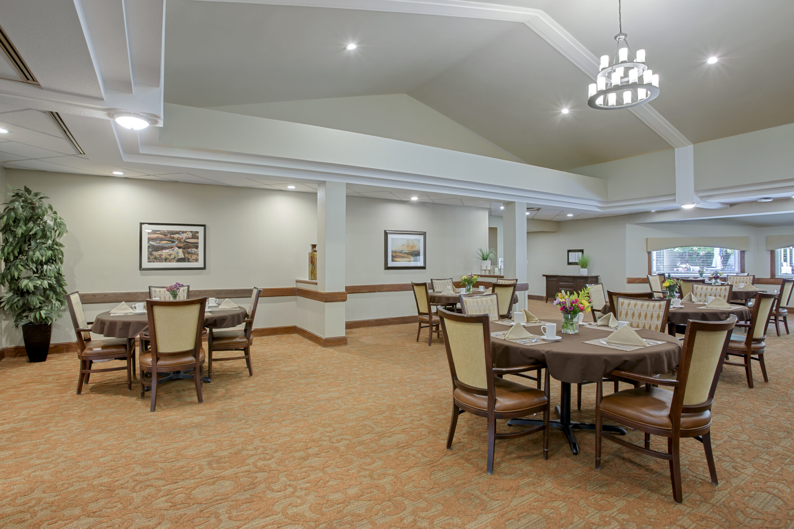 Dining area with tables set for a meal