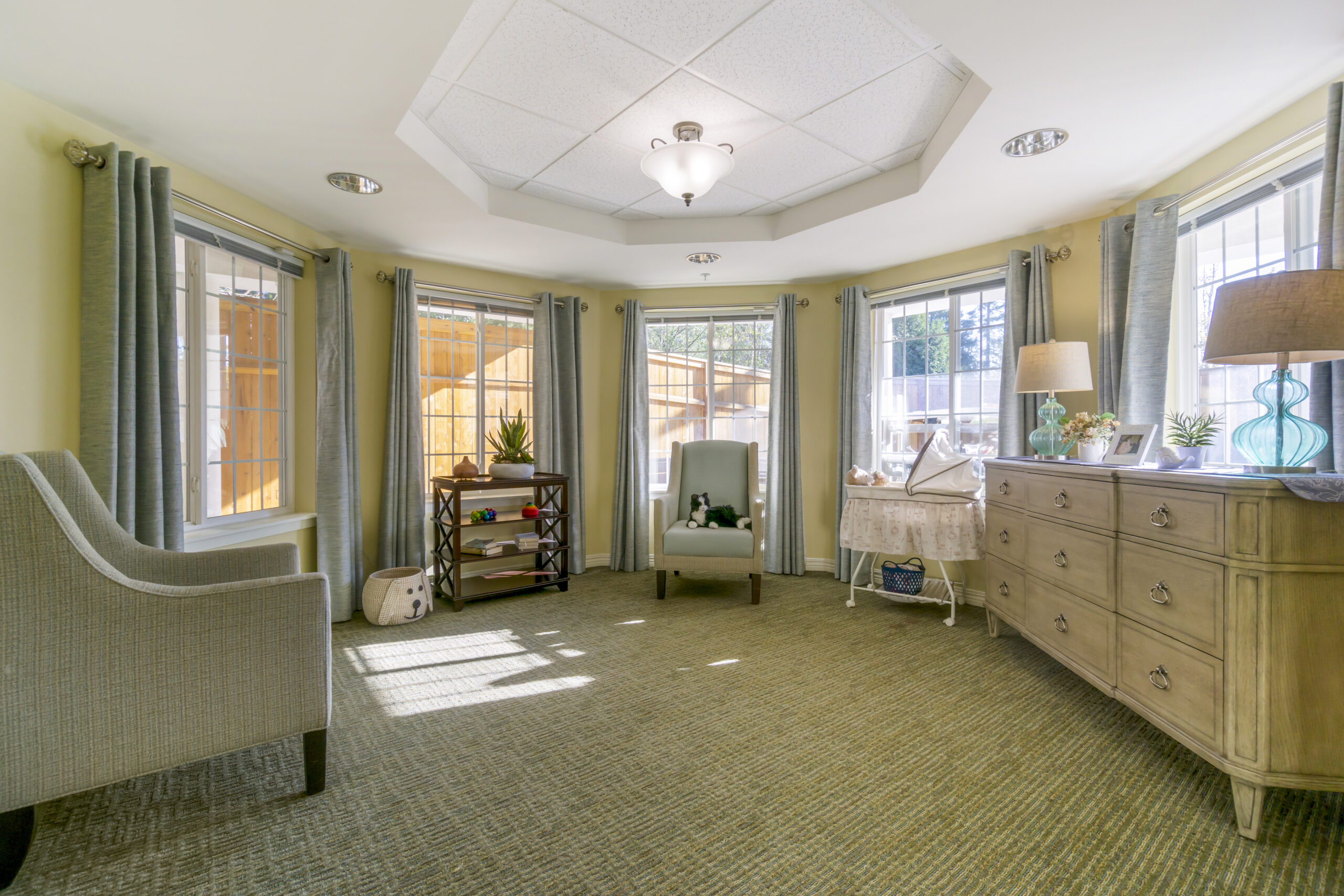 Bright common area with seating and natural light