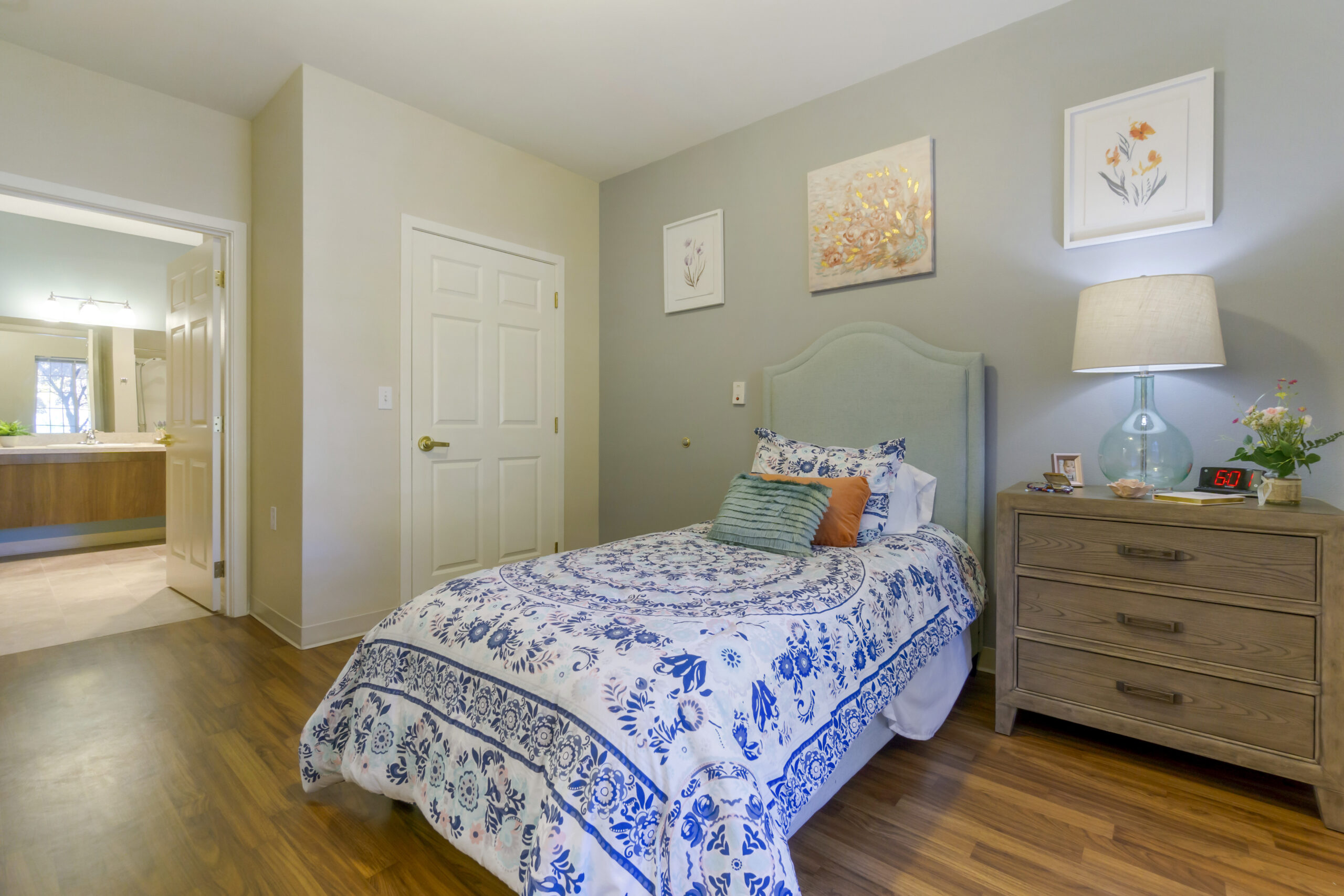 Cozy private resident room with floral bedding