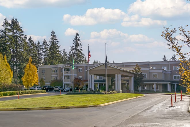 Exterior view of Brookdale Foundation House with landscaped entry