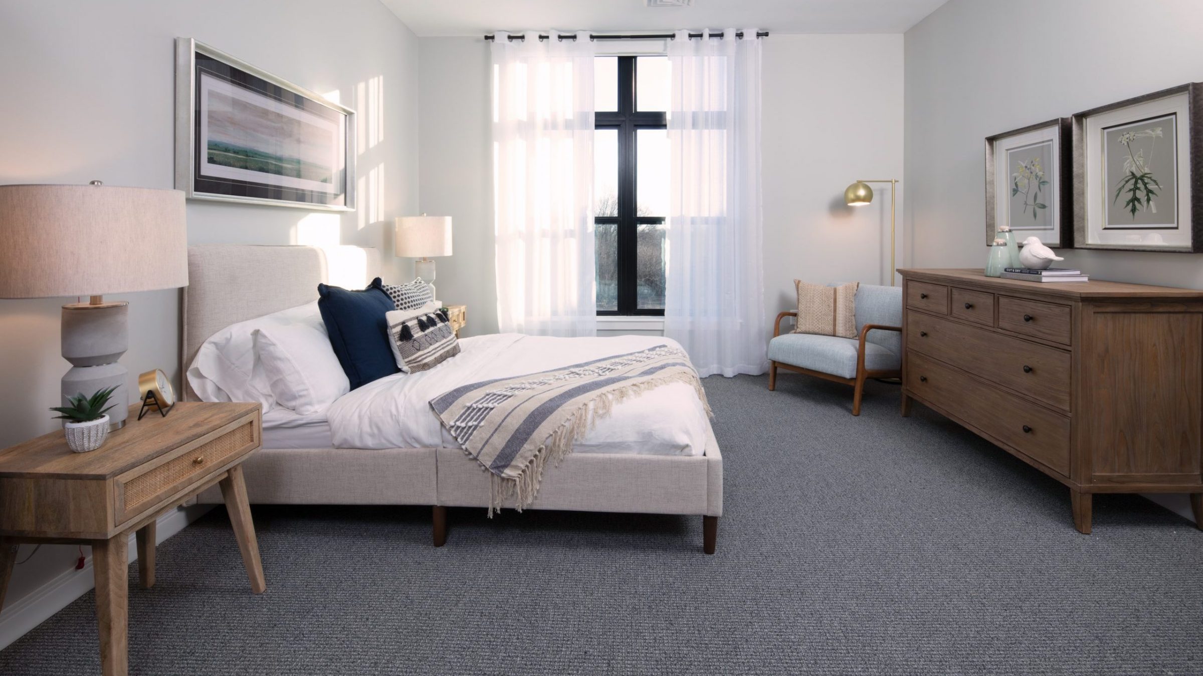 A well-furnished private resident room in a senior living facility