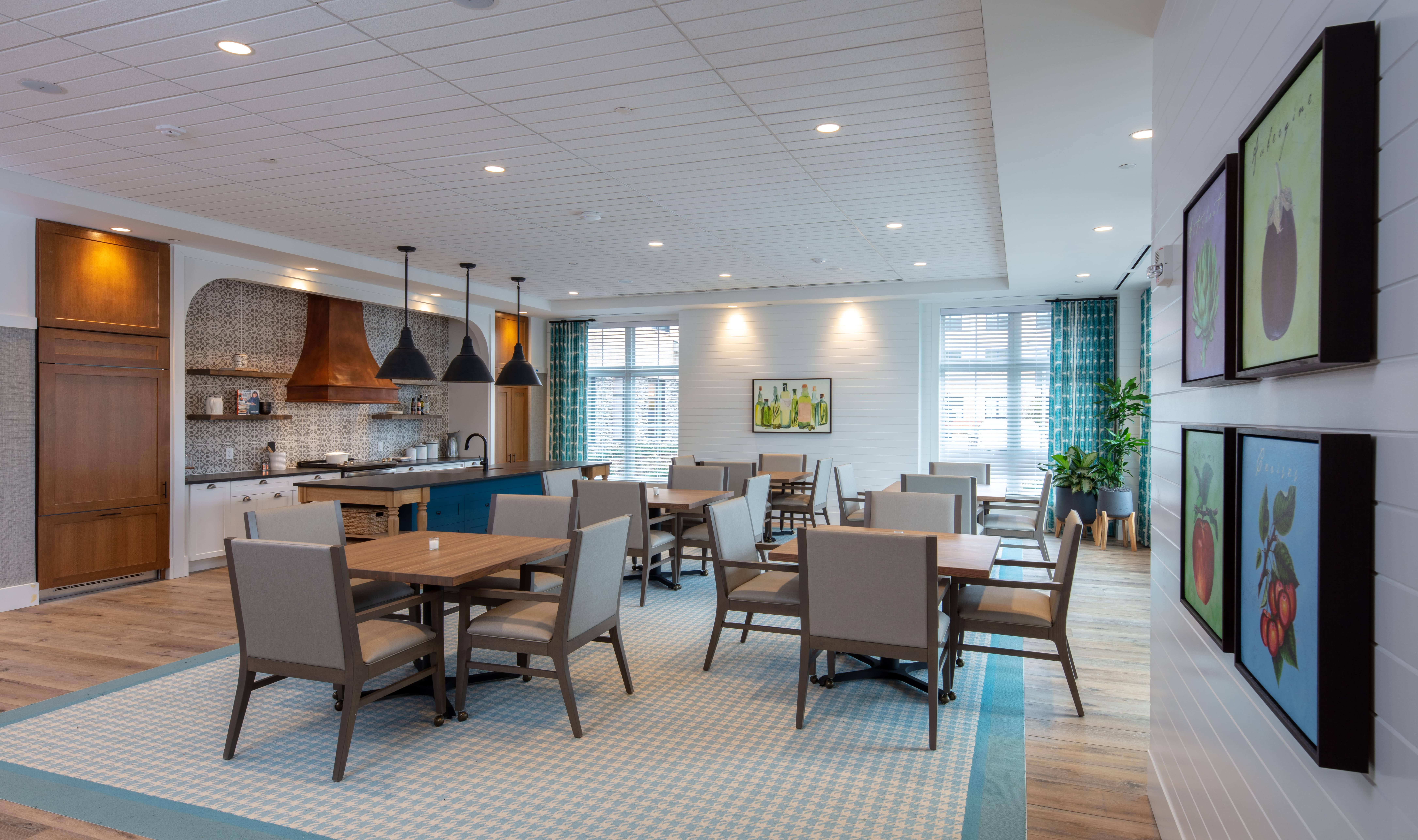 Bright and modern common area with dining tables