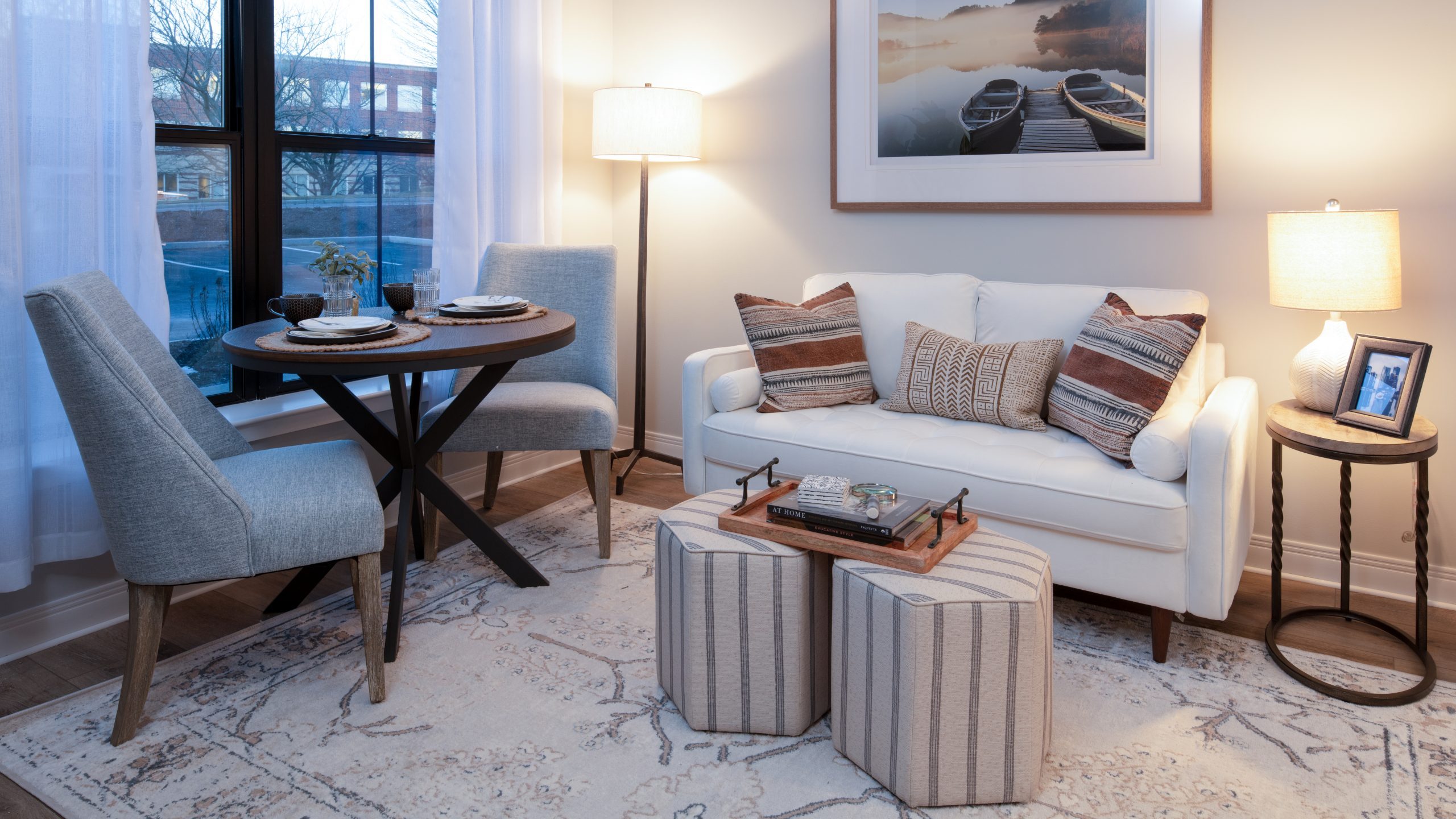 Cozy living room setup with a sofa and dining table