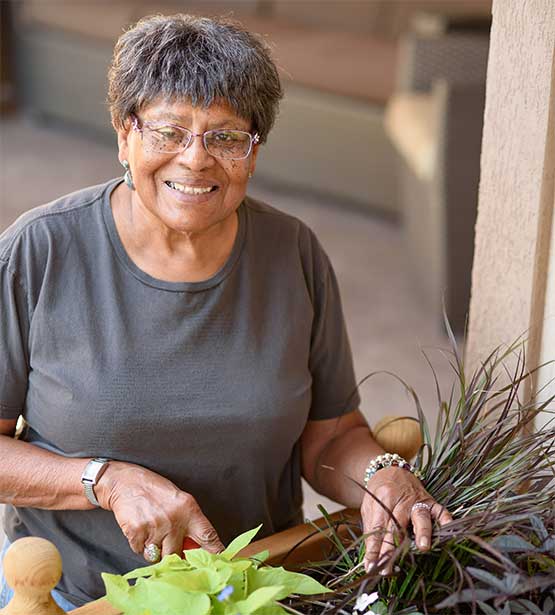 Resident engaged in gardening activity