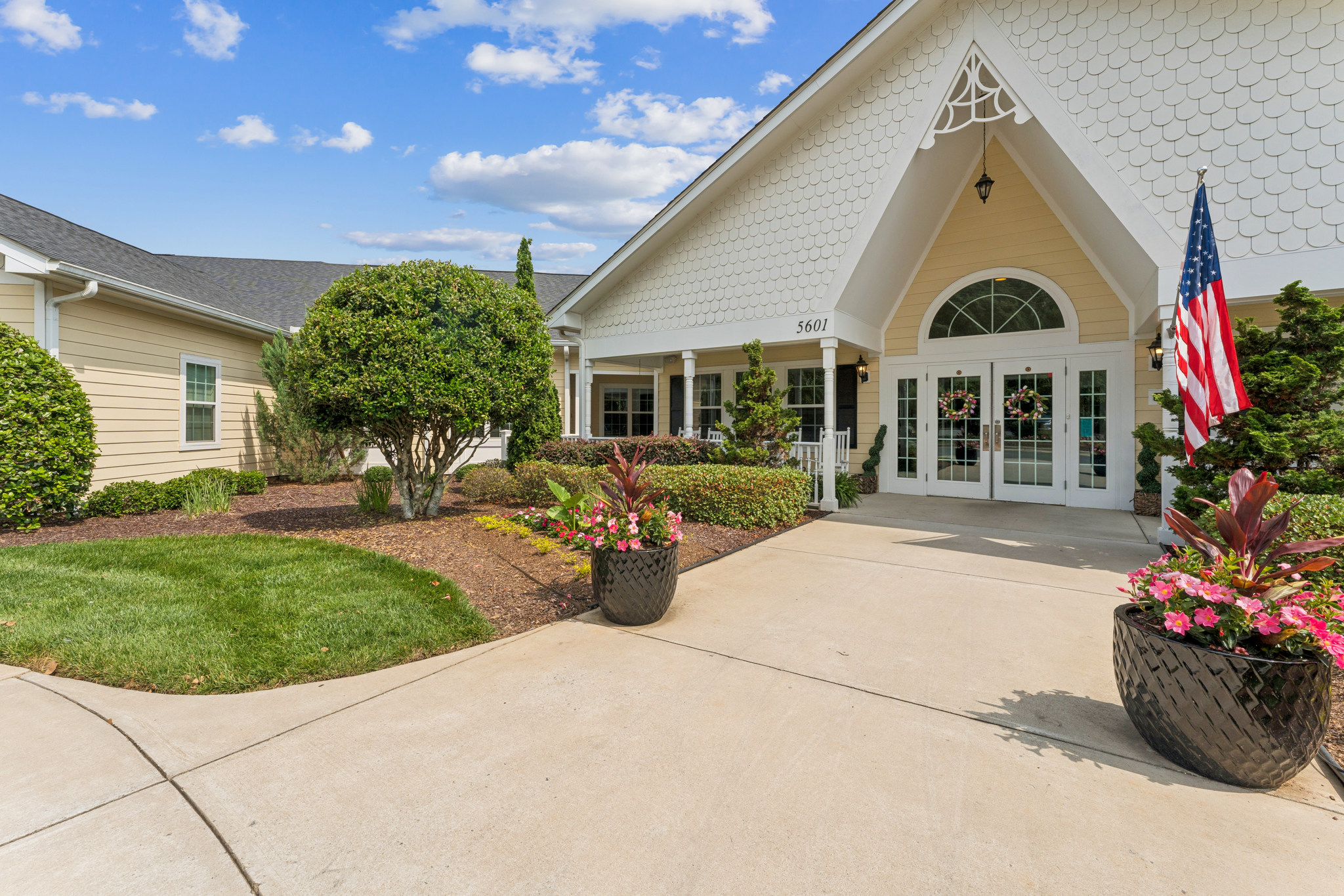 Exterior view of the facility entrance with landscaping