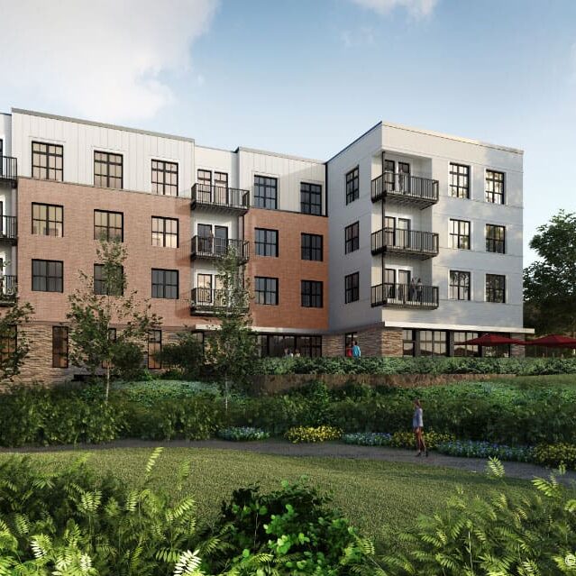 Exterior view of a senior living facility with landscaping