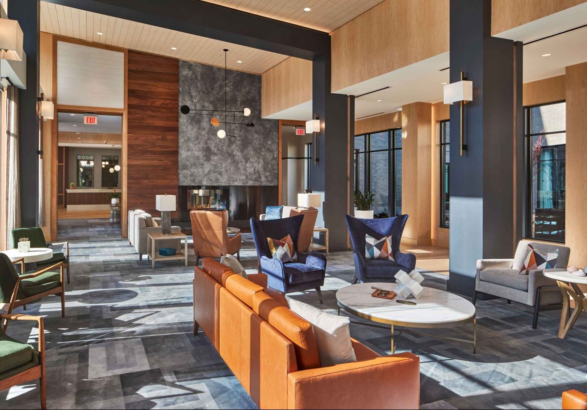 Spacious and modern common area with seating