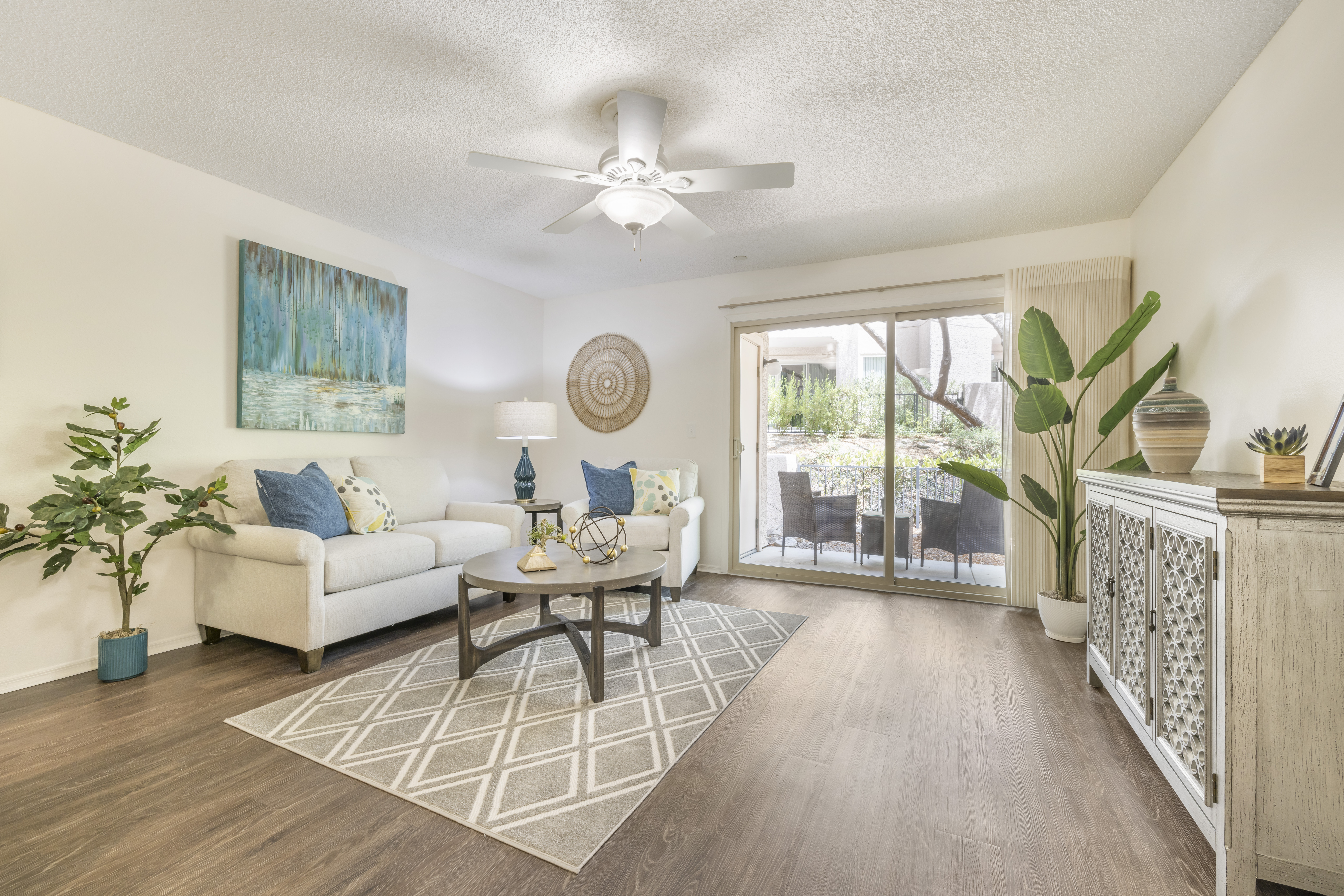 Bright lounge area with comfortable seating and decor