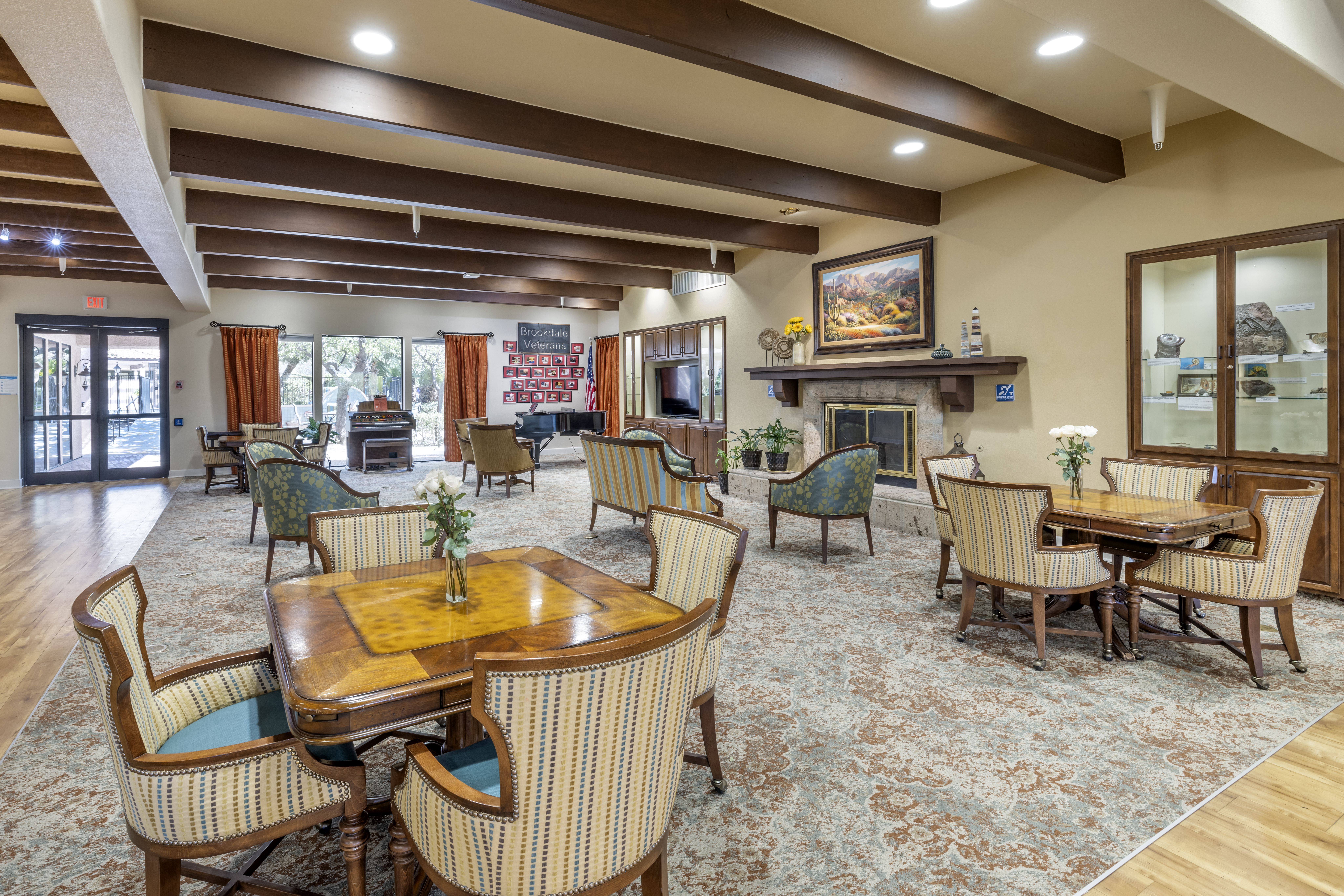 Common area with seating and decor in a nursing home