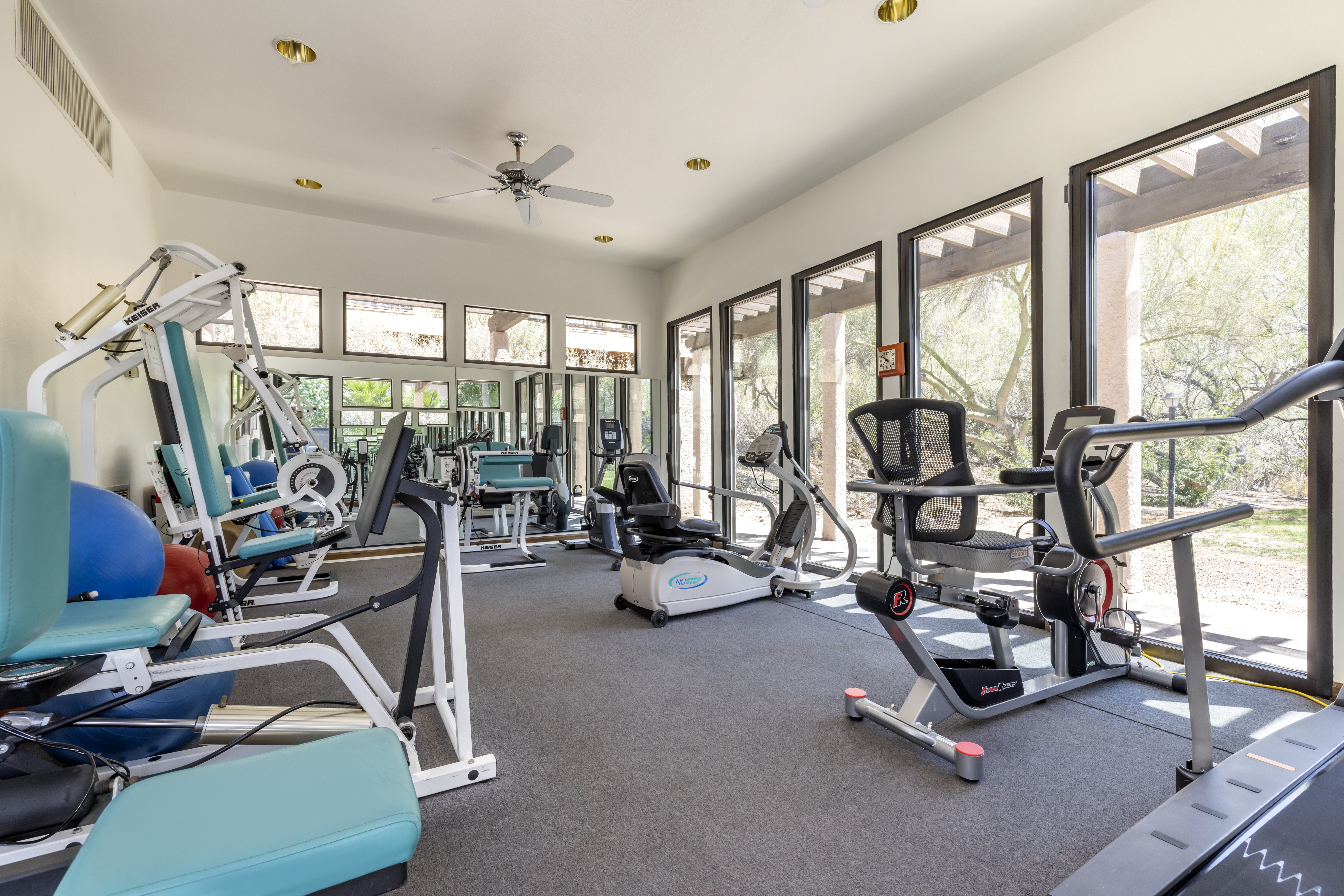 Interior view of a fitness room with exercise equipment