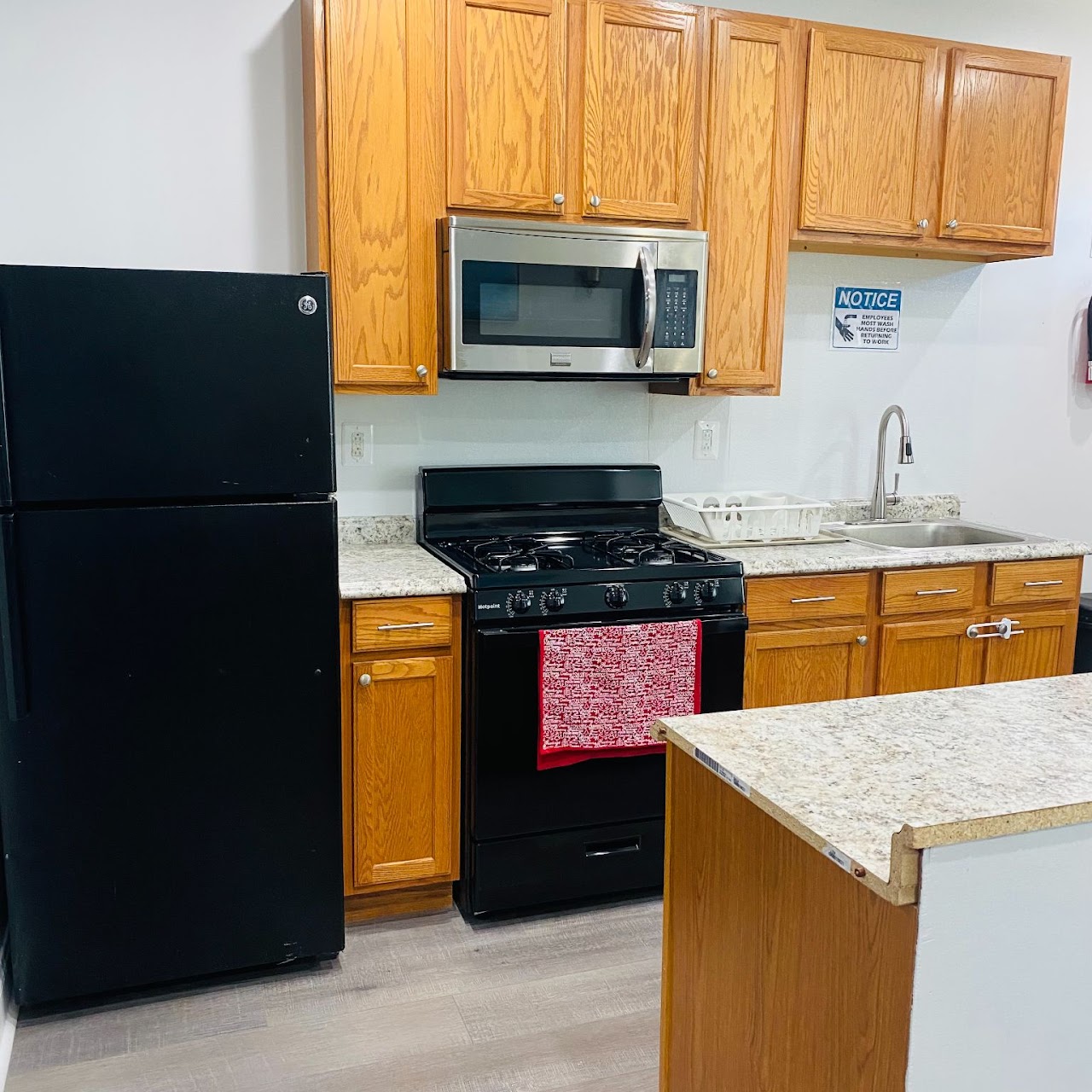 Bright kitchen area with modern appliances