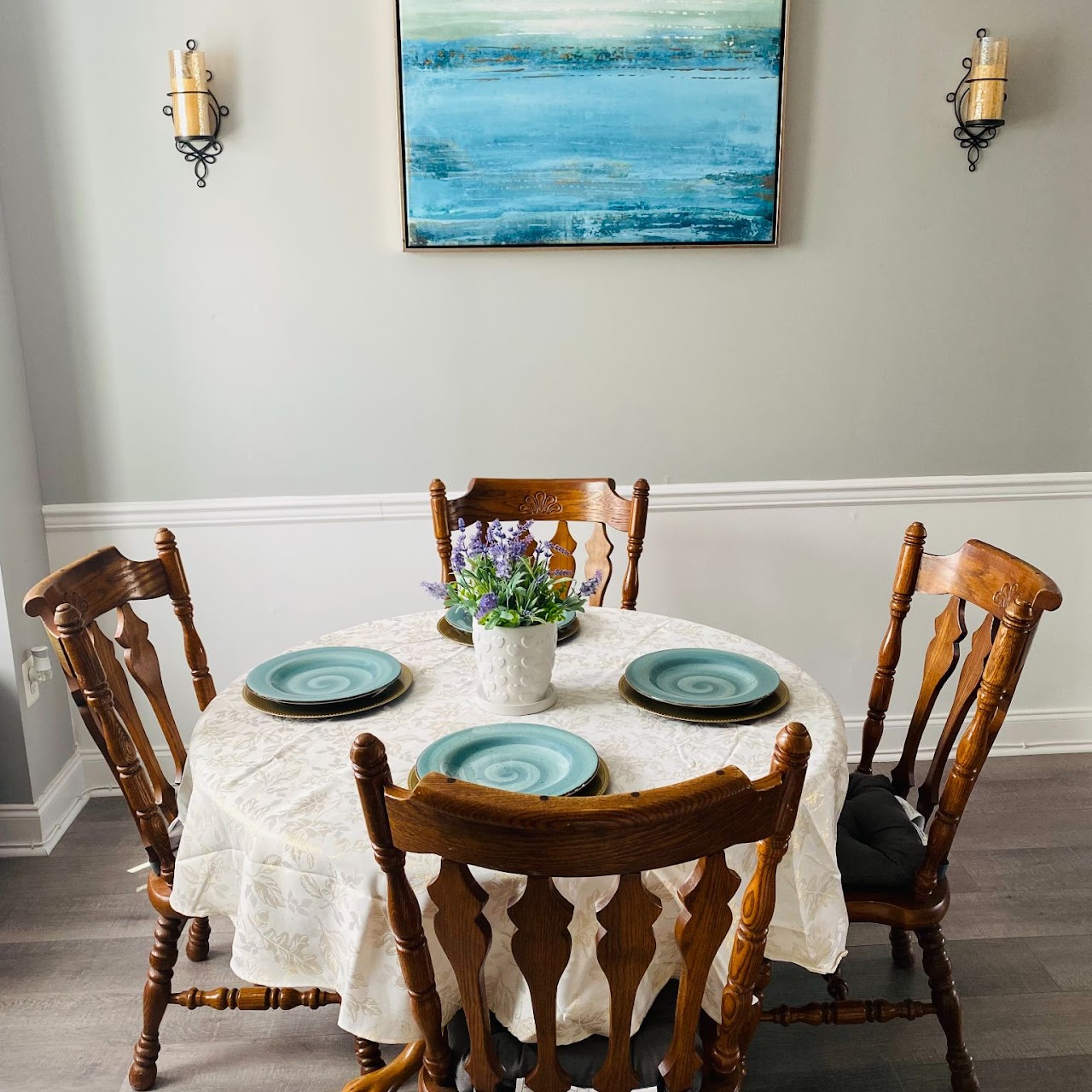 Dining table set with plates and flowers
