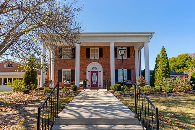 Exterior view of a brick assisted living facility