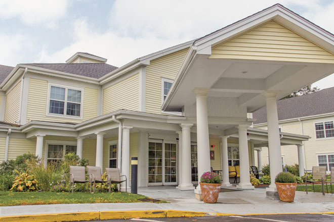 Exterior view of a senior living facility entrance