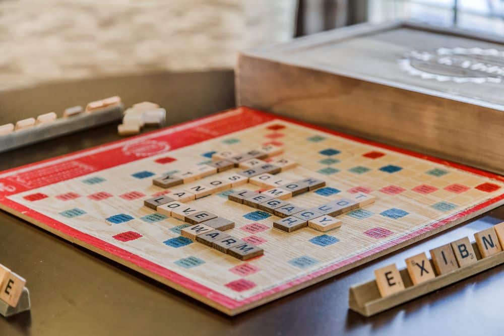 Scrabble game with letters spelling Legacy.