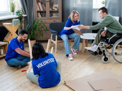 Residents and volunteers engaging in an activity