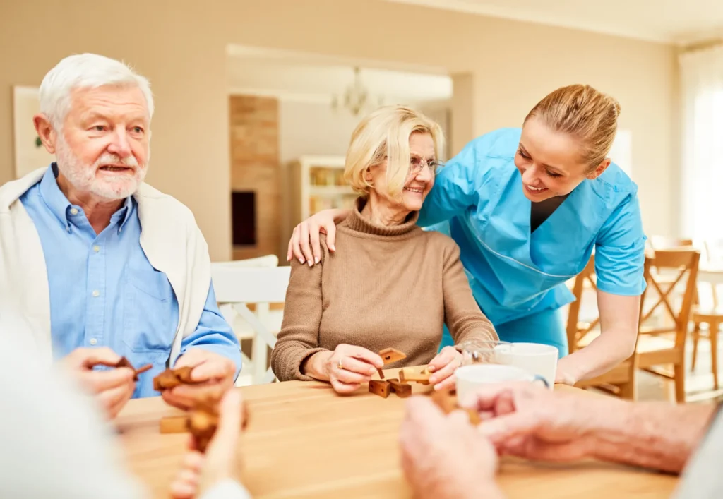 Staff interacting with residents during an activity.