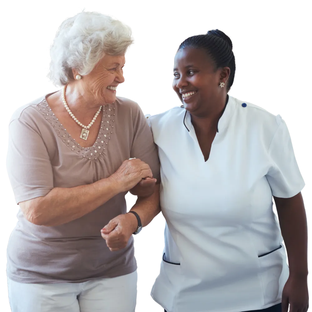Senior resident joyfully interacting with caregiver.