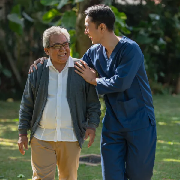 Caregiver and senior enjoying time outdoors
