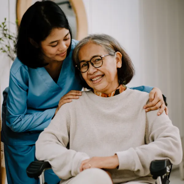 Caregiver interacting with an elderly resident