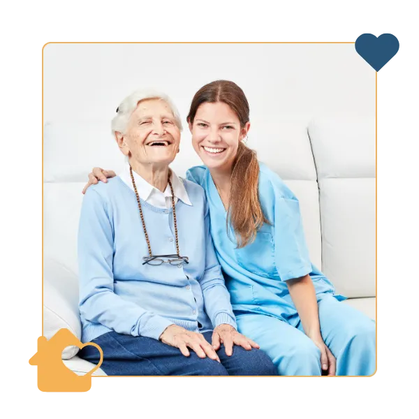 Smiling elderly woman with caregiver