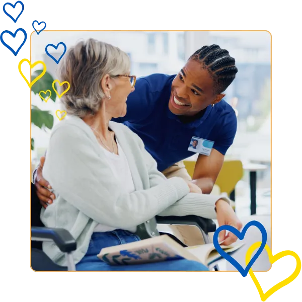 Caregiver interacting warmly with a resident