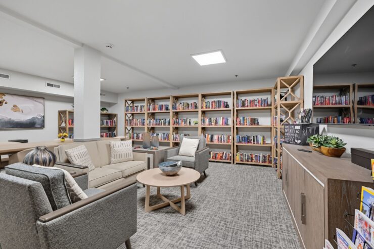 Cozy common area with bookshelves and seating
