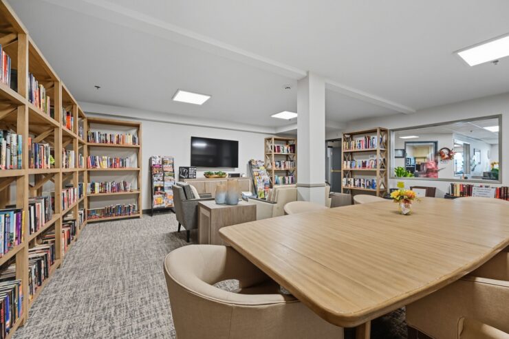 Cozy reading area with bookshelves and seating.