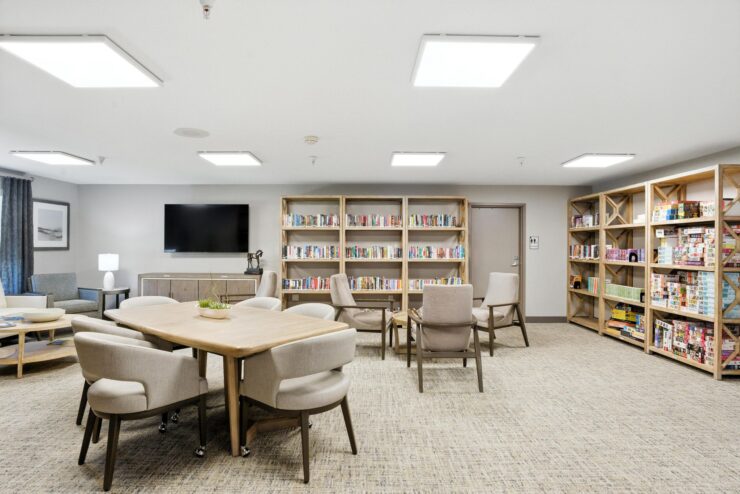 Interior common area with bookshelves and seating