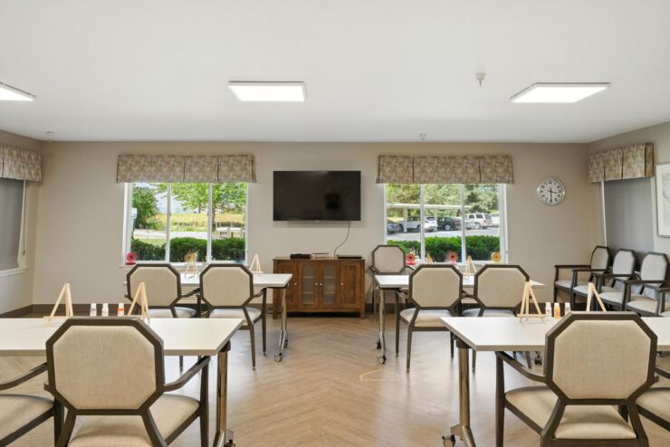 Common area with tables and TV