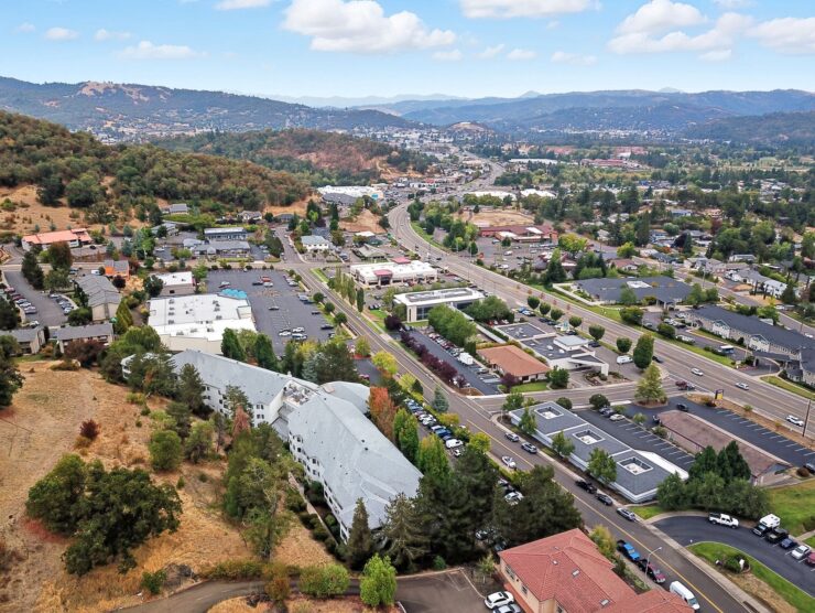Aerial view of the surrounding area and facility.