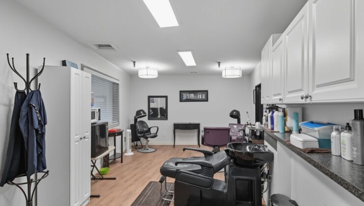 Salon area with styling chairs and product station
