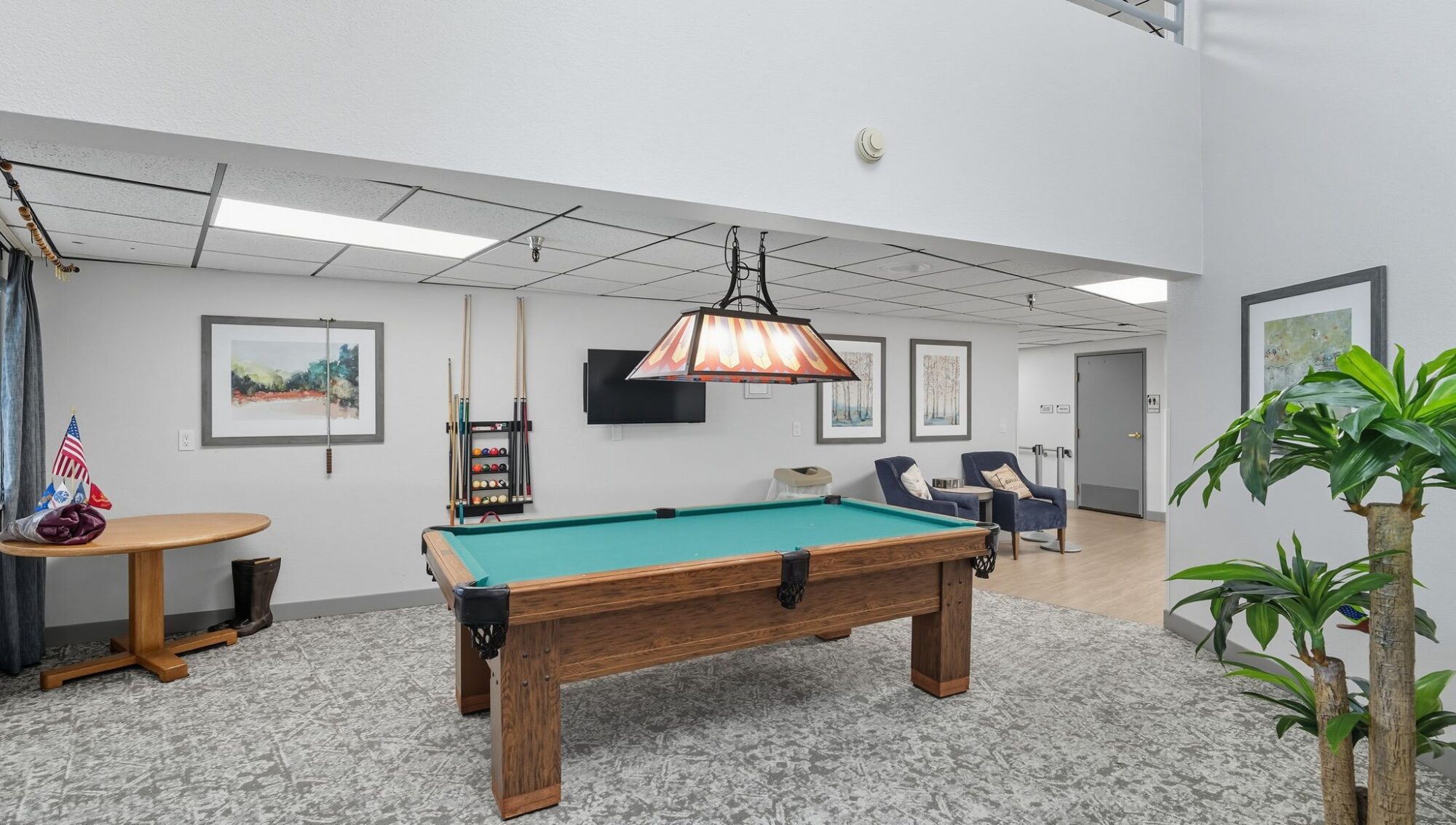 Pool table in a recreation area.