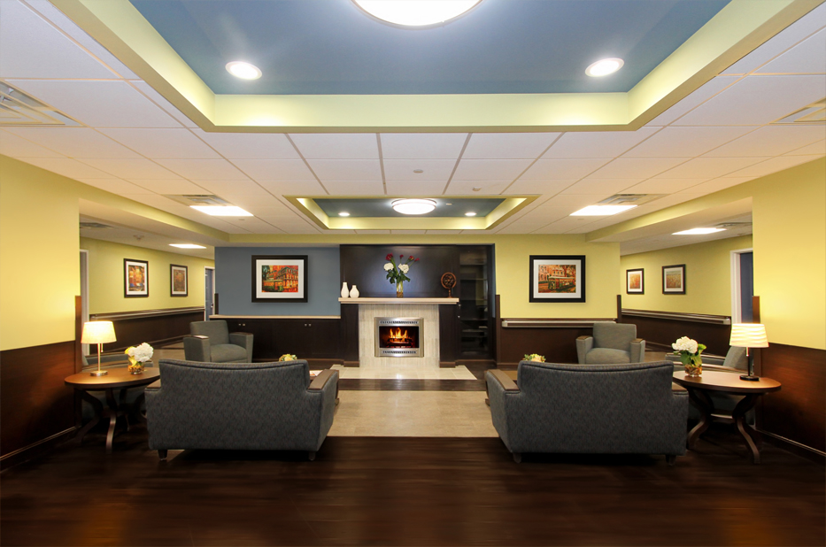 Cozy common area with seating and a fireplace