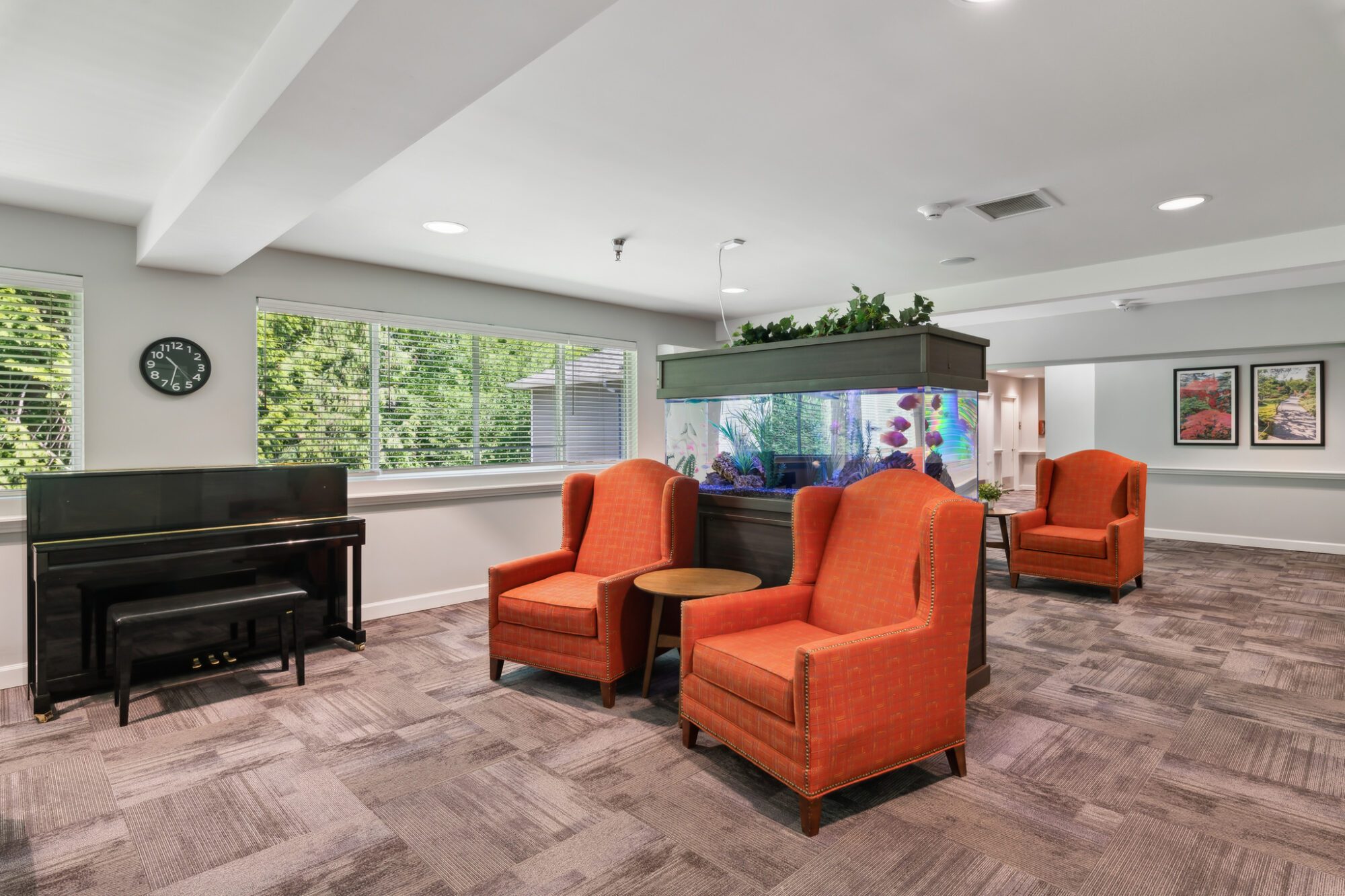 Common area with seating and an aquarium