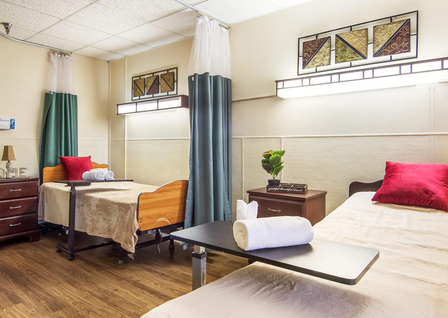 A well-furnished resident room with two beds