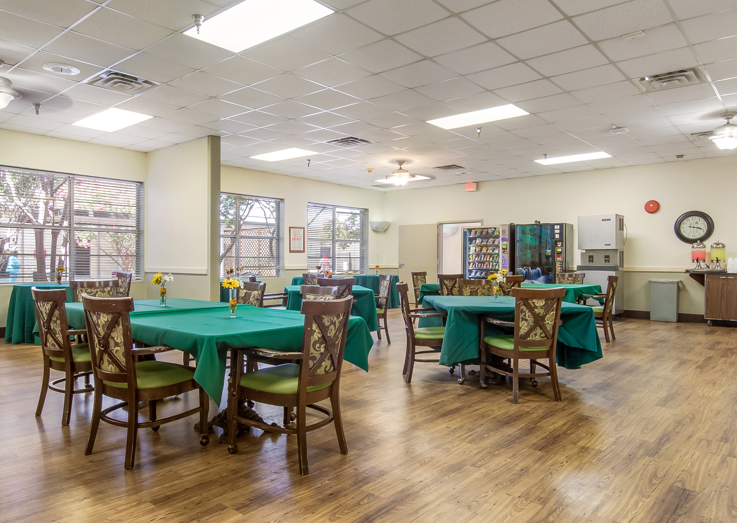 Bright dining area with tables and chairs