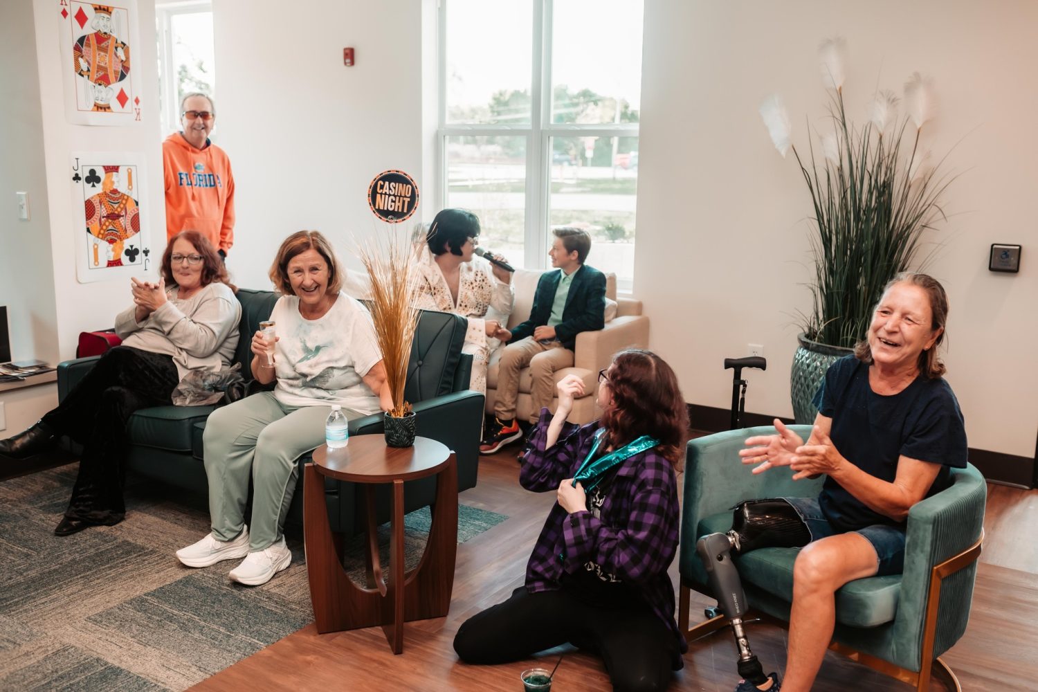 Residents enjoying a casino night in a social lounge