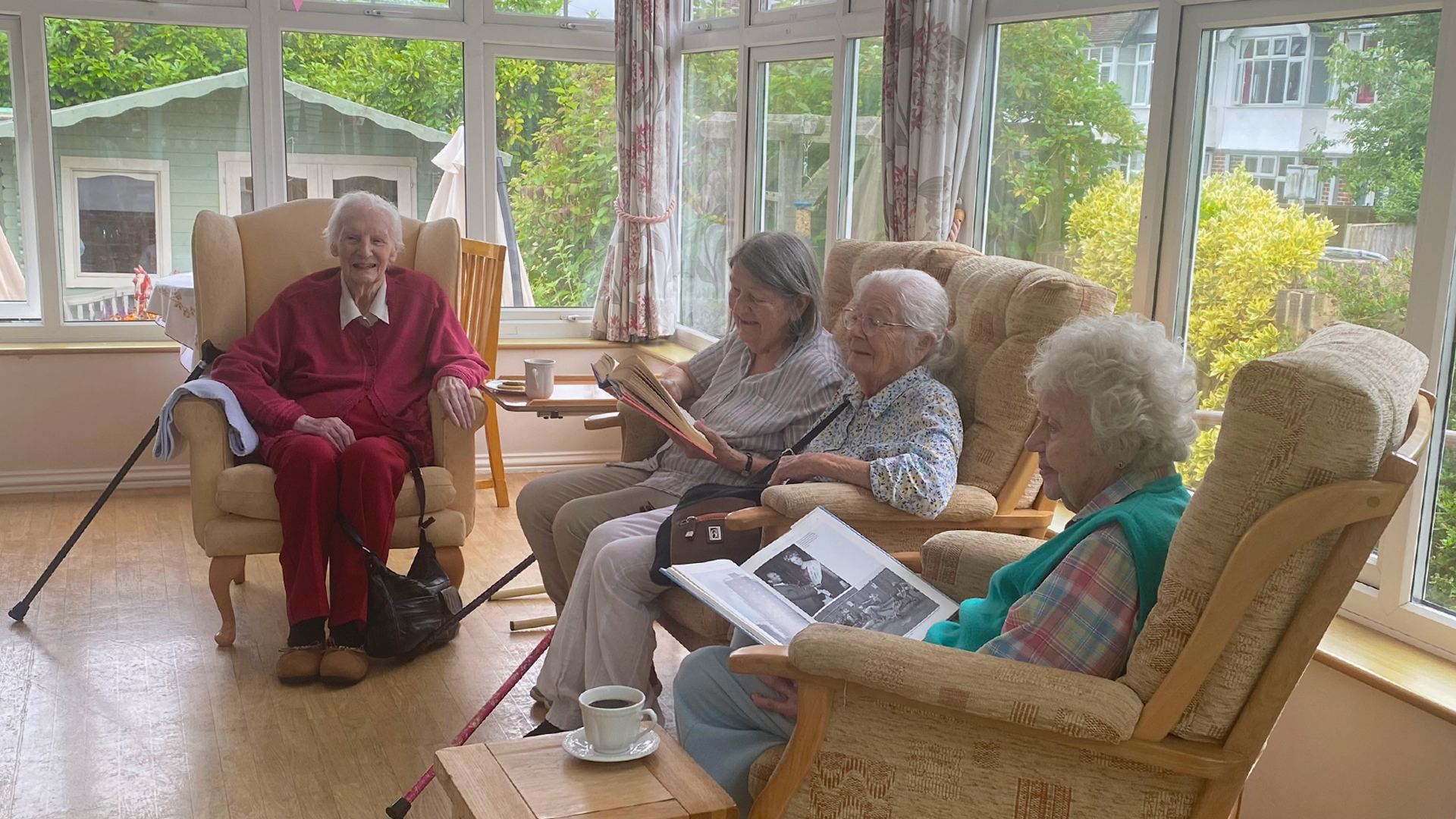 Residents enjoying a cozy afternoon in a common area
