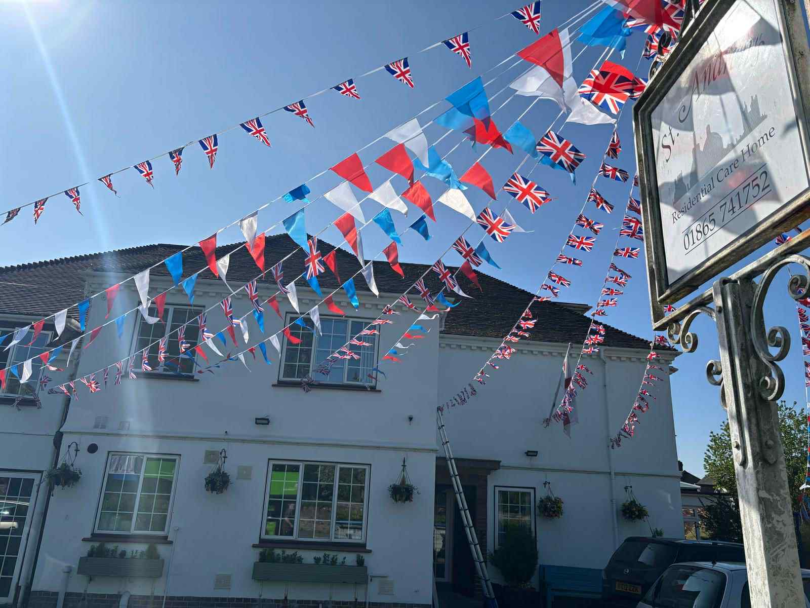 Building exterior decorated with flags for an event
