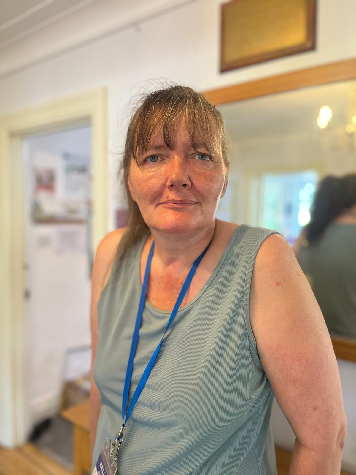Staff member in a common area of the facility