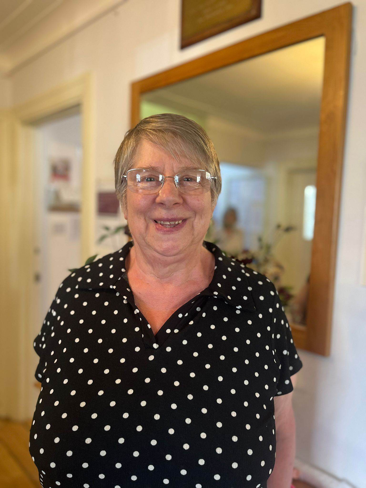 Resident smiling in a common area