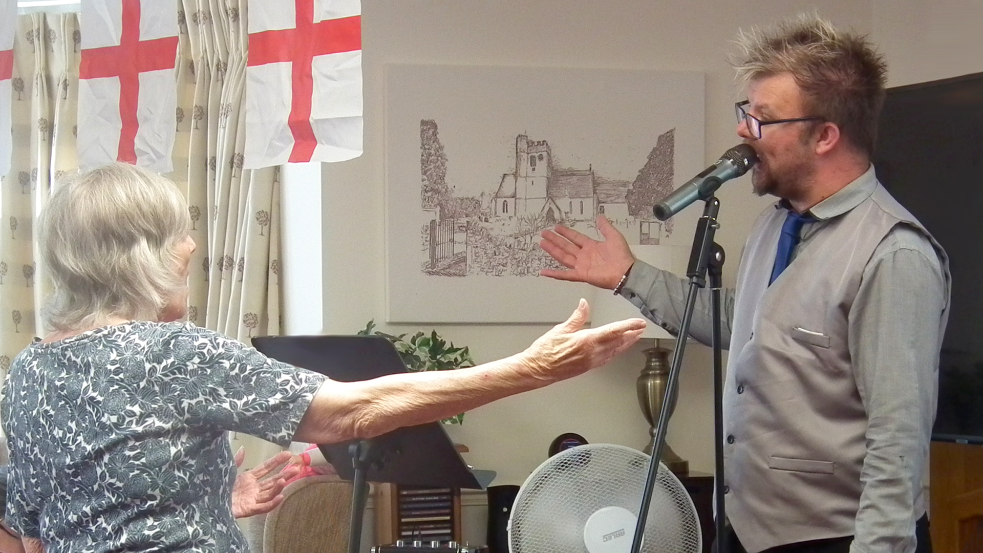 Residents enjoying a performance in the common area