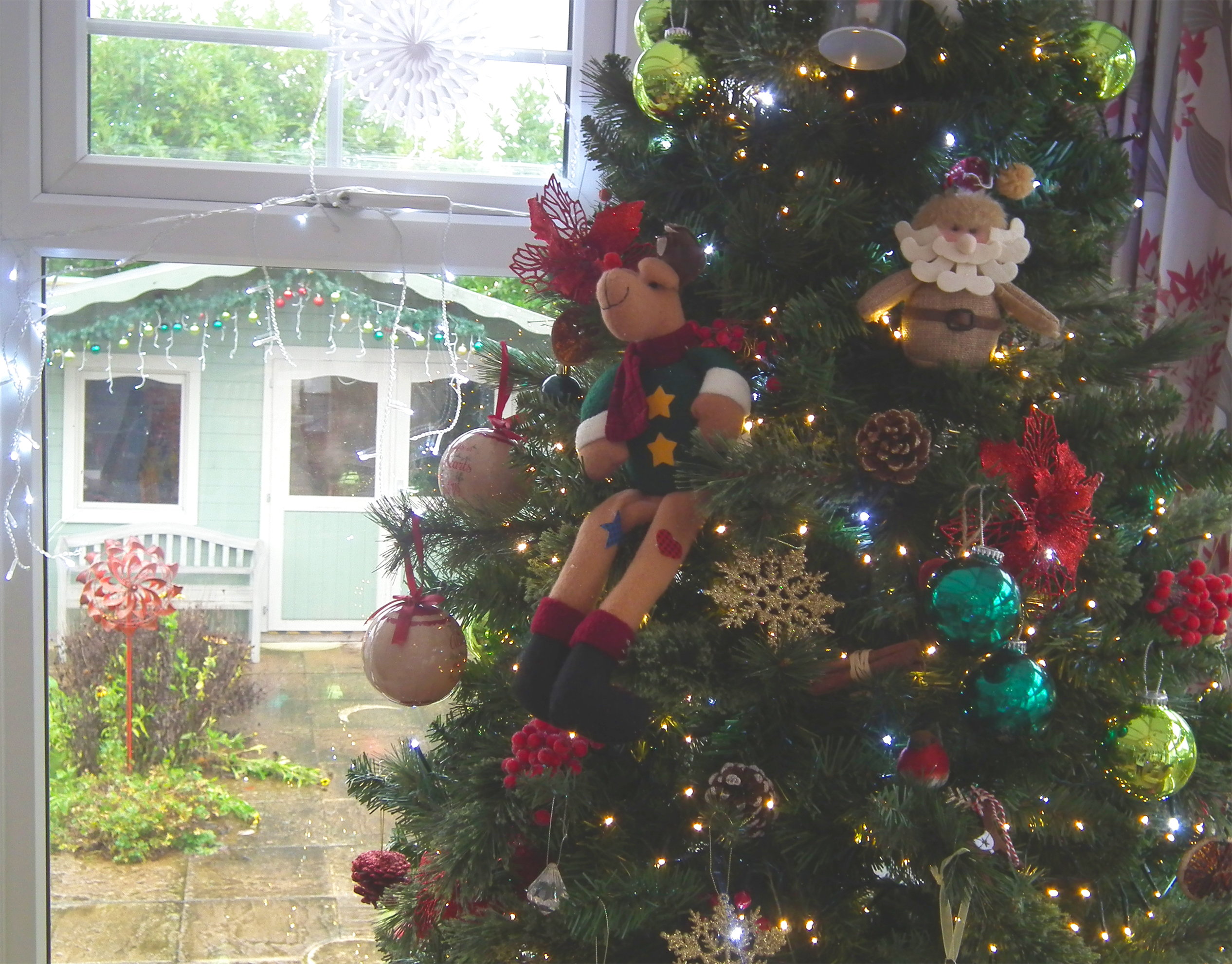 A decorated Christmas tree in a common area